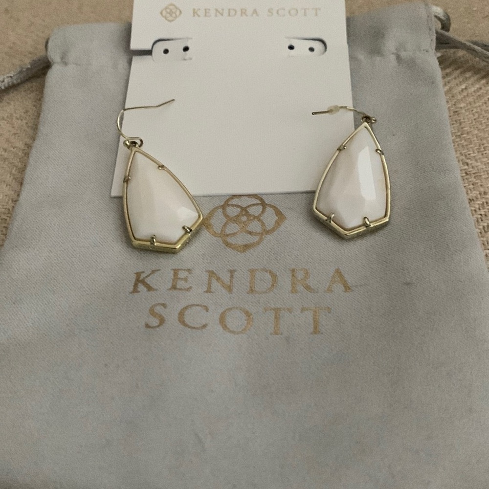 Kendra Scott white and gold dangle earrings